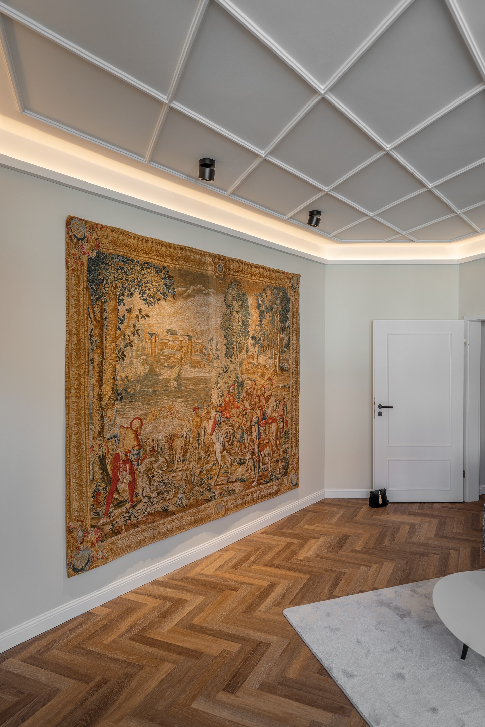 Decorative chair rails guiding the eye upward and enhancing the architectural ceiling composition.