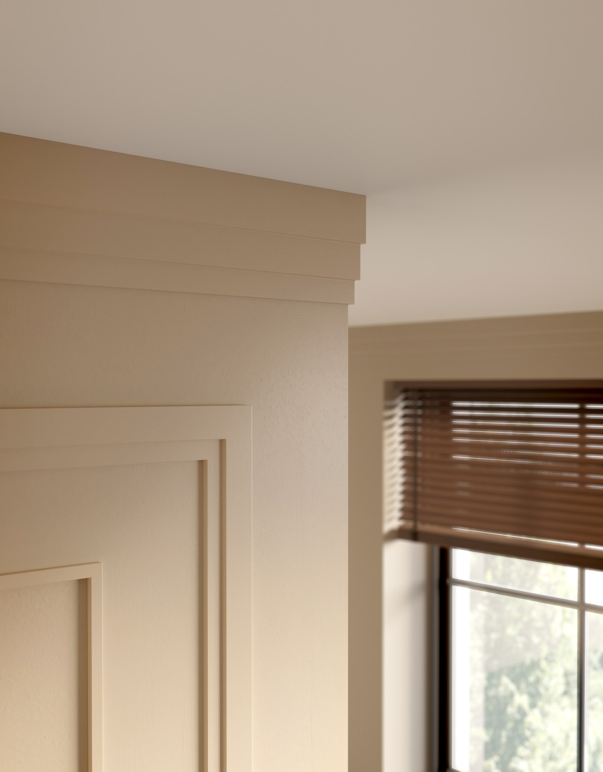 Layered cornices creating a clean architectural transition between wall and ceiling.